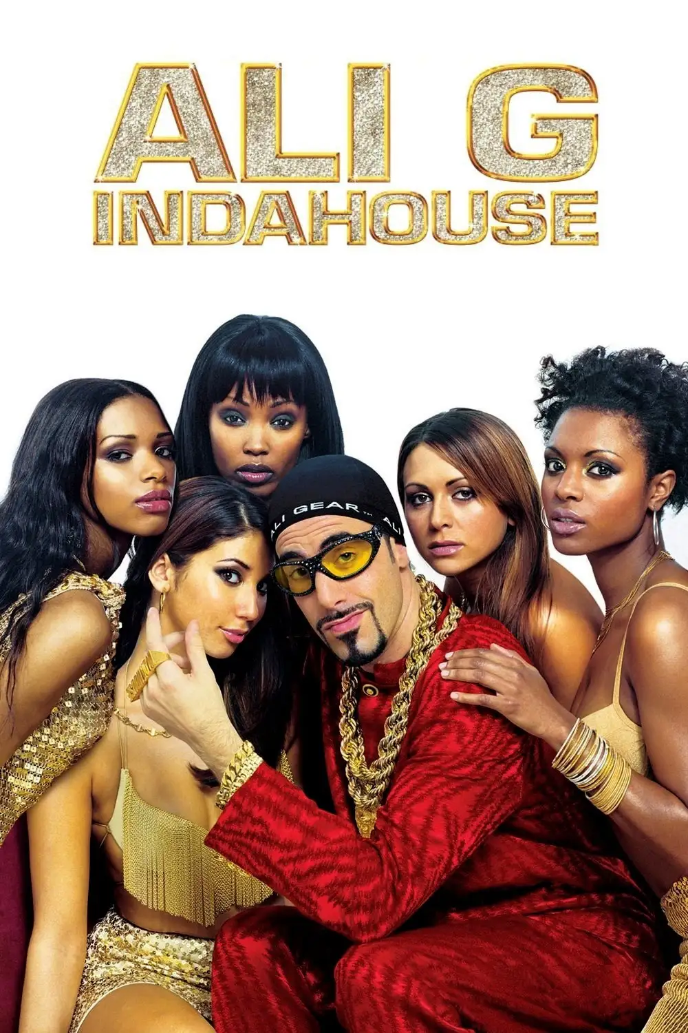 Sacha Baron Cohen as Ali G, in yellow tracksuit and tinted glasses.